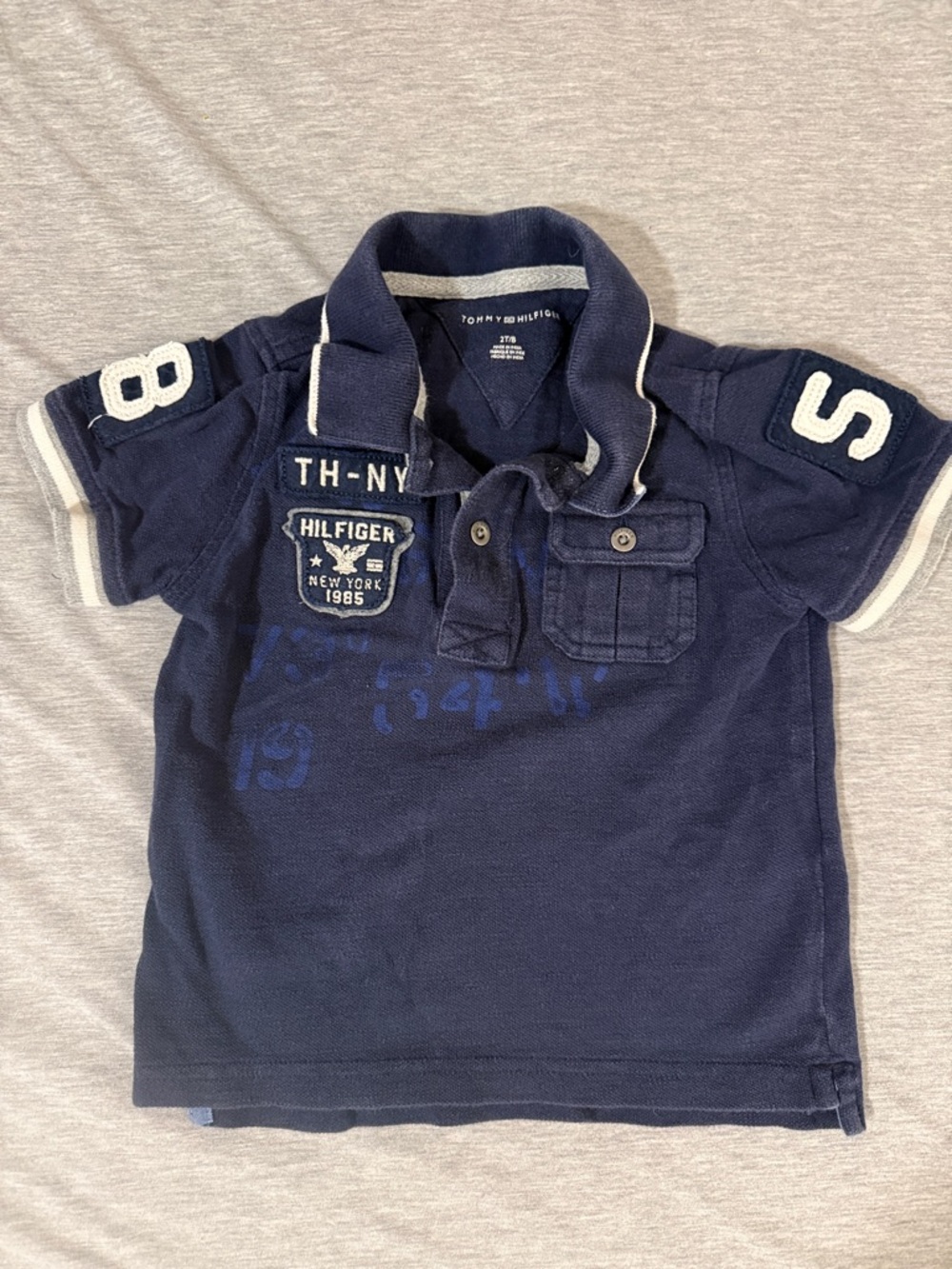 Tommy Hilfiger Navy Polo with Patch & Embroidered Accents